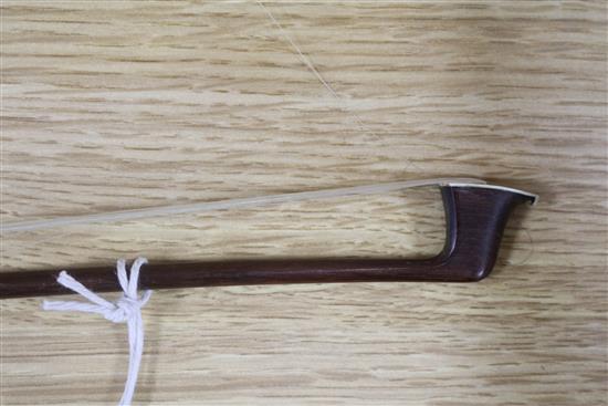 A violin bow by August Edwin Prager, nickel-mounted, stamped, L 74.5cm, 56gr